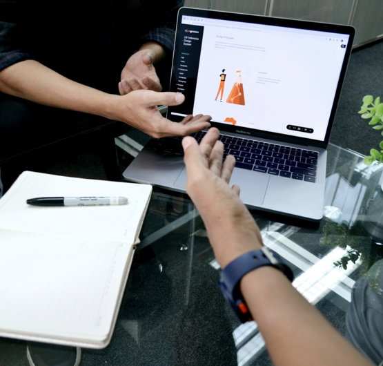 person-using-macbook-pro-on-white-table.jpg person using macbook pro on white table